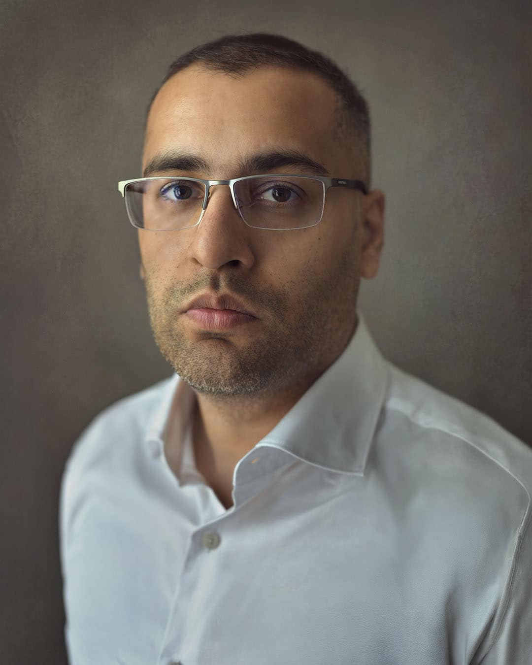 Corporate headshots in Dubai created with natural window light by the award-winning photographer at Martin Portrait.