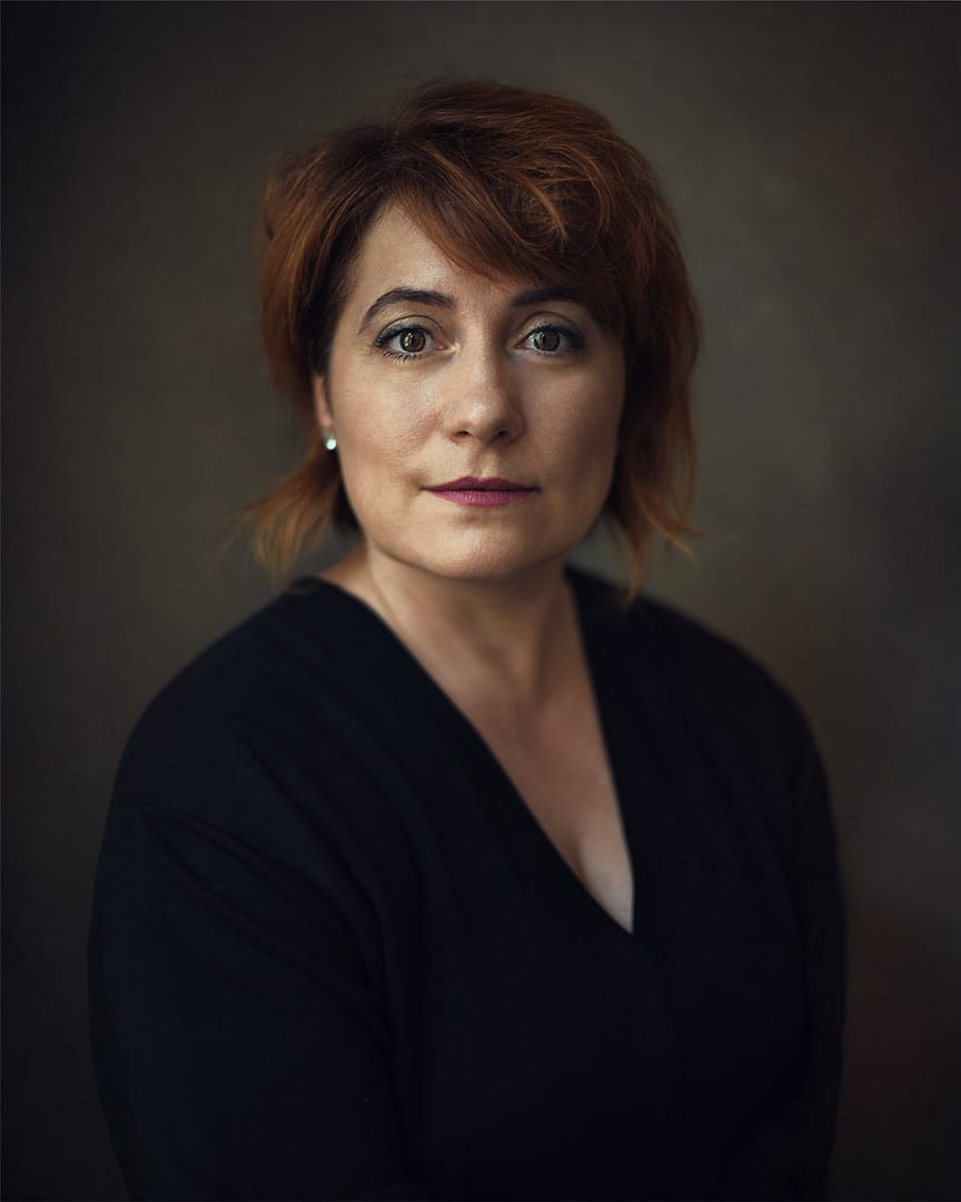 Fine art portrait exemplifying techniques from a 'portrait photography how-to' guide.