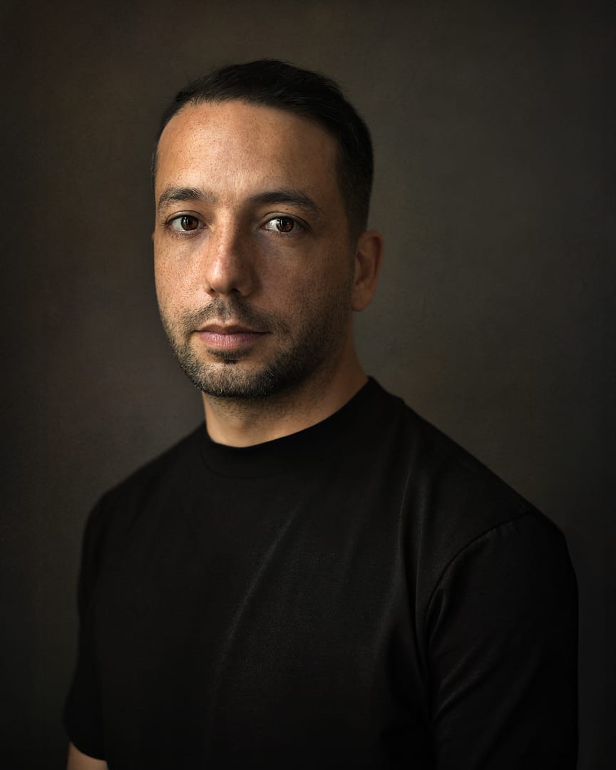 Best portrait photographer in Dubai capturing a fine art portrait with natural light, creating a timeless and elegant look